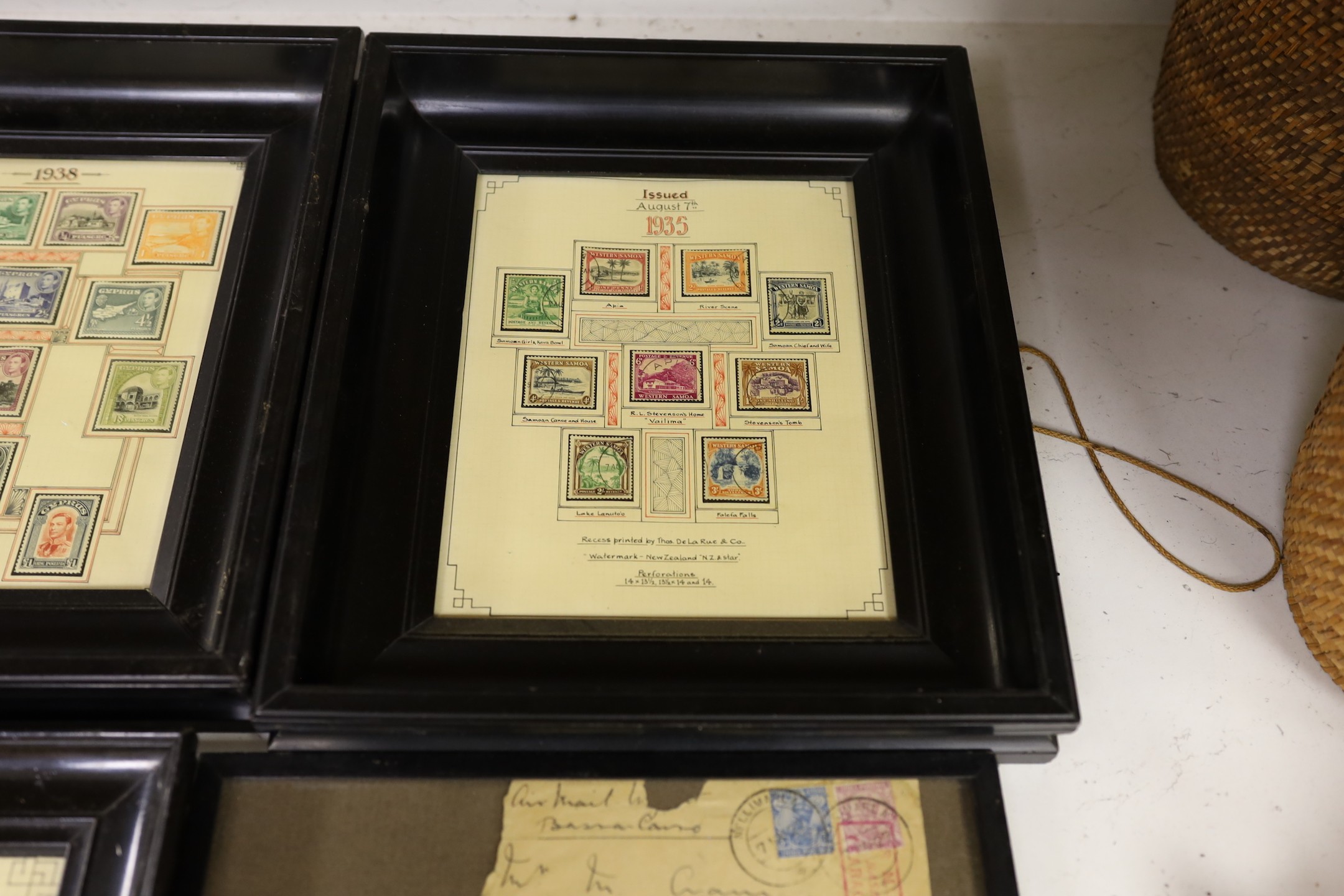 A collection of framed 1980's commemorative stamps, together with full sheets Guernsey, North Ireland and Scotland